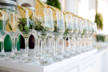 cocktail bar,  cocktail glass. 
pineapple cocktail