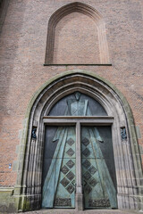 Entrance door to 98-meter high Onze Lieve Vrouwetoren (Our Lady tower, 15th century) or Langejan (Long John), the third-tallest church tower in the Netherlands. Amersfoort. the Netherlands.