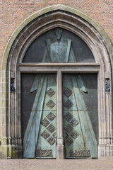 Entrance door to 98-meter high Onze Lieve Vrouwetoren (Our Lady tower, 15th century) or Langejan (Long John), the third-tallest church tower in the Netherlands. Amersfoort. the Netherlands.