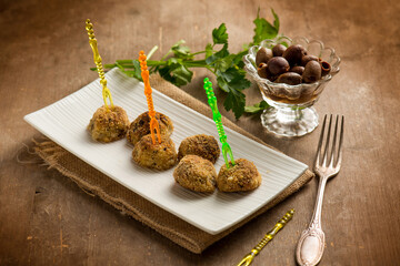 finger food vegatarian meatballs with black olives