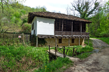 Typical street and old houses at village of Bozhentsi, Bulgaria