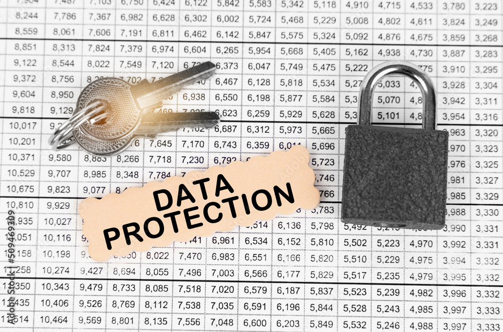 Poster against the background of a table with reports, a lock, keys and a sign with the inscription - data 