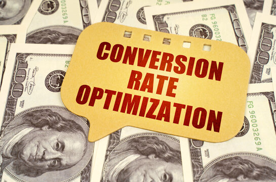 On the dollars is a sign with the inscription - conversion rate optimization