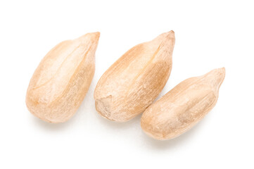 Peeled sunflower seeds on white background, top view