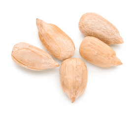 Peeled sunflower seeds on white background, top view