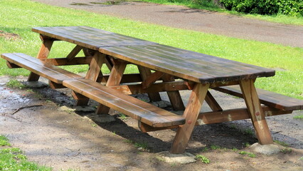 wet picnic table after rain in the park