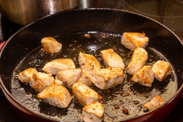 turkey fillet pieces frying on nonstick pan