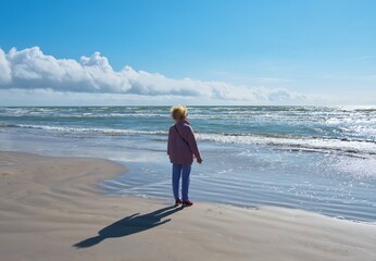 Relax on the beach. The woman is meditating.