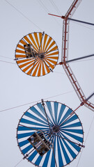 A shot from below of an amusement park ride