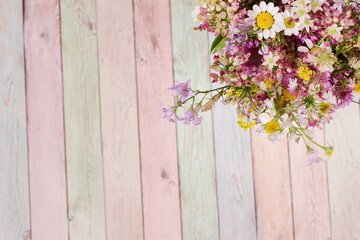 Colorful wooden table and flowers