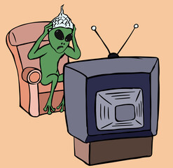 Scared alien with a foil cap watching tv.