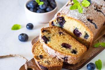 Fototapeta na wymiar Blueberry cake on white background. Homemade sweet baking.