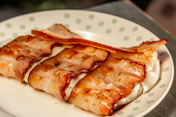 Cod fish wrapped in bacon