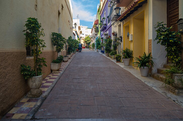 Fototapeta na wymiar Colorful buildings and narrow streets in the historic center of the Mediterranean town of Calpe, Spain