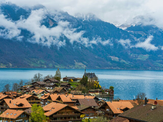 Naklejka premium Iseltwald village on Lake Brienz in Interlaken-Oberhasli canton of Bern, Switzerland