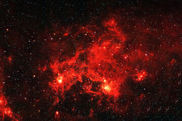 Bright red galaxy, on a dark background. Elements of this image furnished by NASA