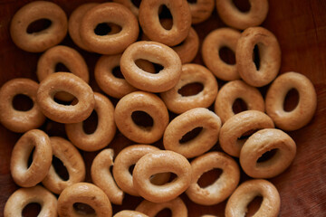 A bunch of oval dryers. Crispy snack for tea, shot from above, close-up food background. High quality photo