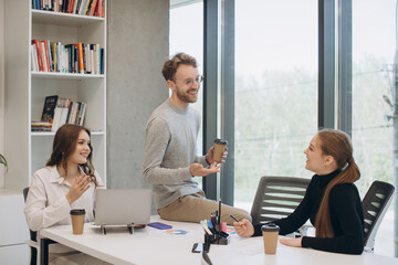 Colleagues in office having an informal meeting