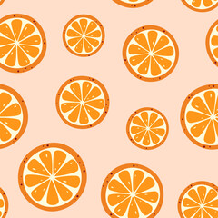 Seamless pattern with orange slices on a pink background
