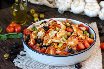 Chicken salad with nice background and cherry tomatoes