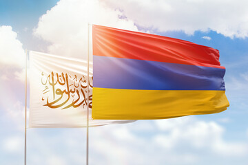 Sunny blue sky and flags of armenia and afghanistan