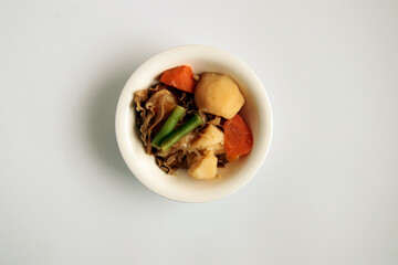 Japanese meat and potatoes on the table