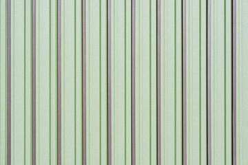 Obraz premium Green corrugated metal fence background.