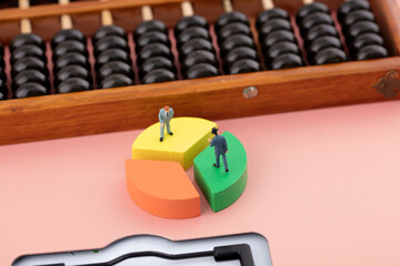 Miniature creative financial investment pie chart