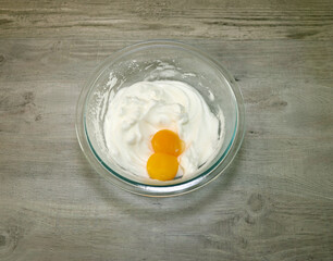 Whipped egg whites with the egg yolks on top.