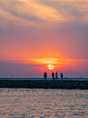Fototapeta premium Sunset view of the lighthouse of Lake Hefner