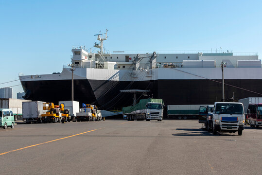 RORO ship and trailer , wharf with cargo ship waiting: Shipping industry