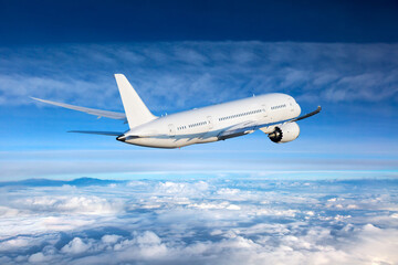 Passenger plane fly away. Back view of aircraft.