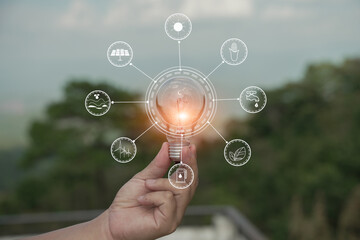 Light bulb Energy saving green nature background