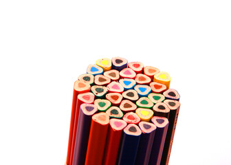 close up photo of a collection of colourful wooden pencil, art supplies. isolated on  studio background with copy space.