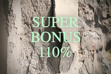 Shot of a broken wall and the text “Super Bonus 100%”