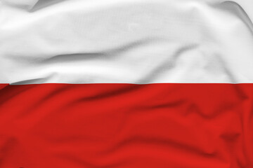 Poland national flag, folds and hard shadows on the canvas