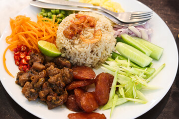 Fried rice with chinese sausage on plate
