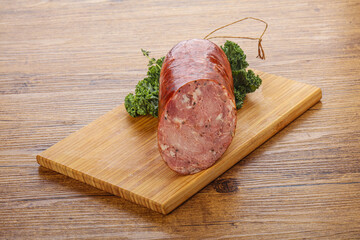 Pork ham sausage over board