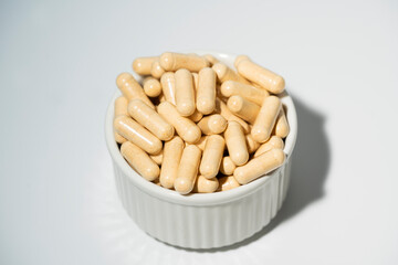 Vitamin pill, herb capsule, Nutritional Supplement.