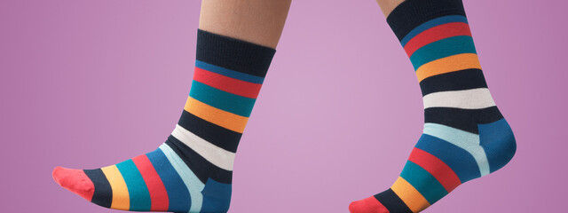 Model posing with multicolor socks