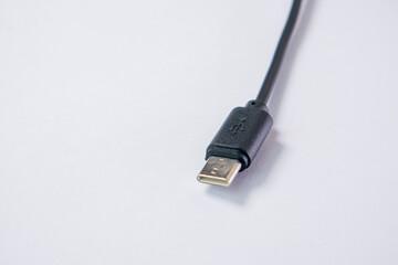 USB type C with black cable isolated on white background