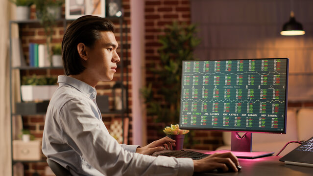 Financial broker looking at forex exchange market statistics changing in real time, following numbers growth to make capital investment. Stock trade data with global sales and banking profit.