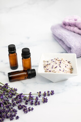 Fototapeta na wymiar Essential Oils and Beauty Supplies with Lavender