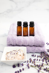 Fototapeta na wymiar Essential Oils and Beauty Supplies with Lavender