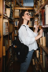 Beautiful girl in a library