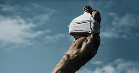 Sexy man with muscular body and bare torso. Muscular shirtless man, attractive guy. Athletic man, fitness model. Sexy torso. Male flexing his muscles. Sport workout bodybuilding.