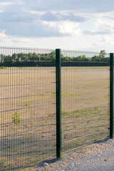 Metal mesh fence outdoors nature.