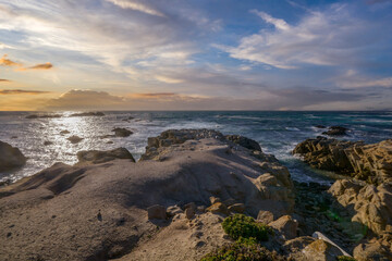 Monterey - view of the coast at sunset.