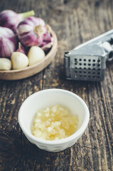 Rustic style garlic on vintage wooden background