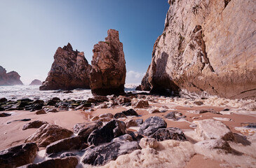 Atlantic ocean beach on the rock coast. Portugal.